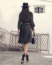 Back Vintage knee-length black and gold long sleeves dress