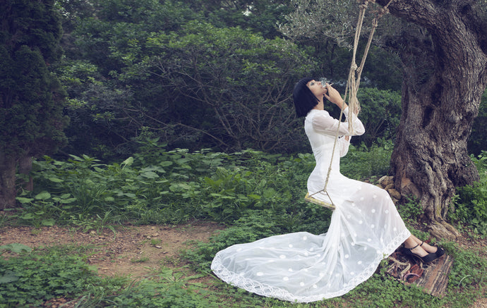 Vintage handmade wedding dress with tail